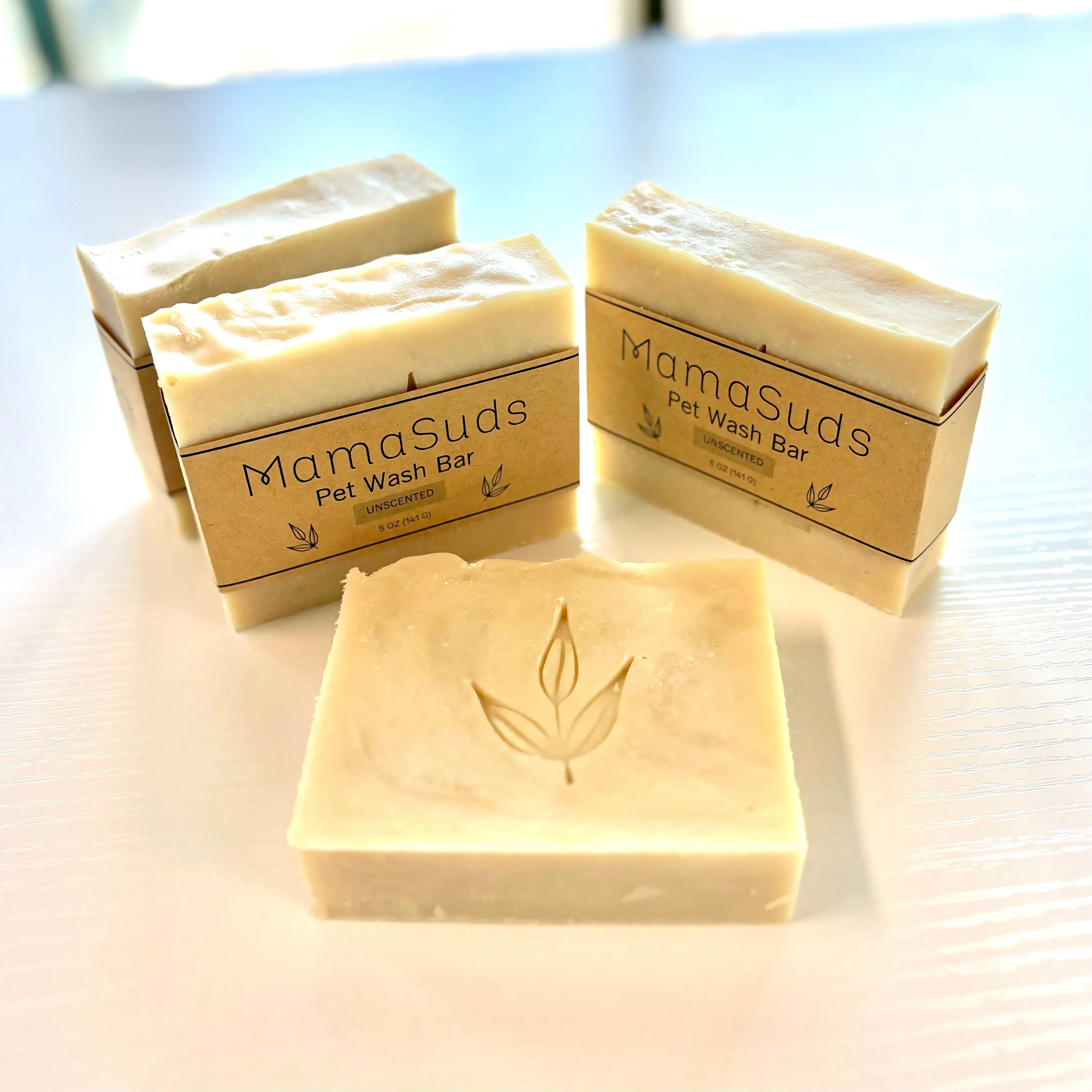 MamaSuds unscented pet wash bars on white table, eco-friendly bath soap at Qu!rk Boutique