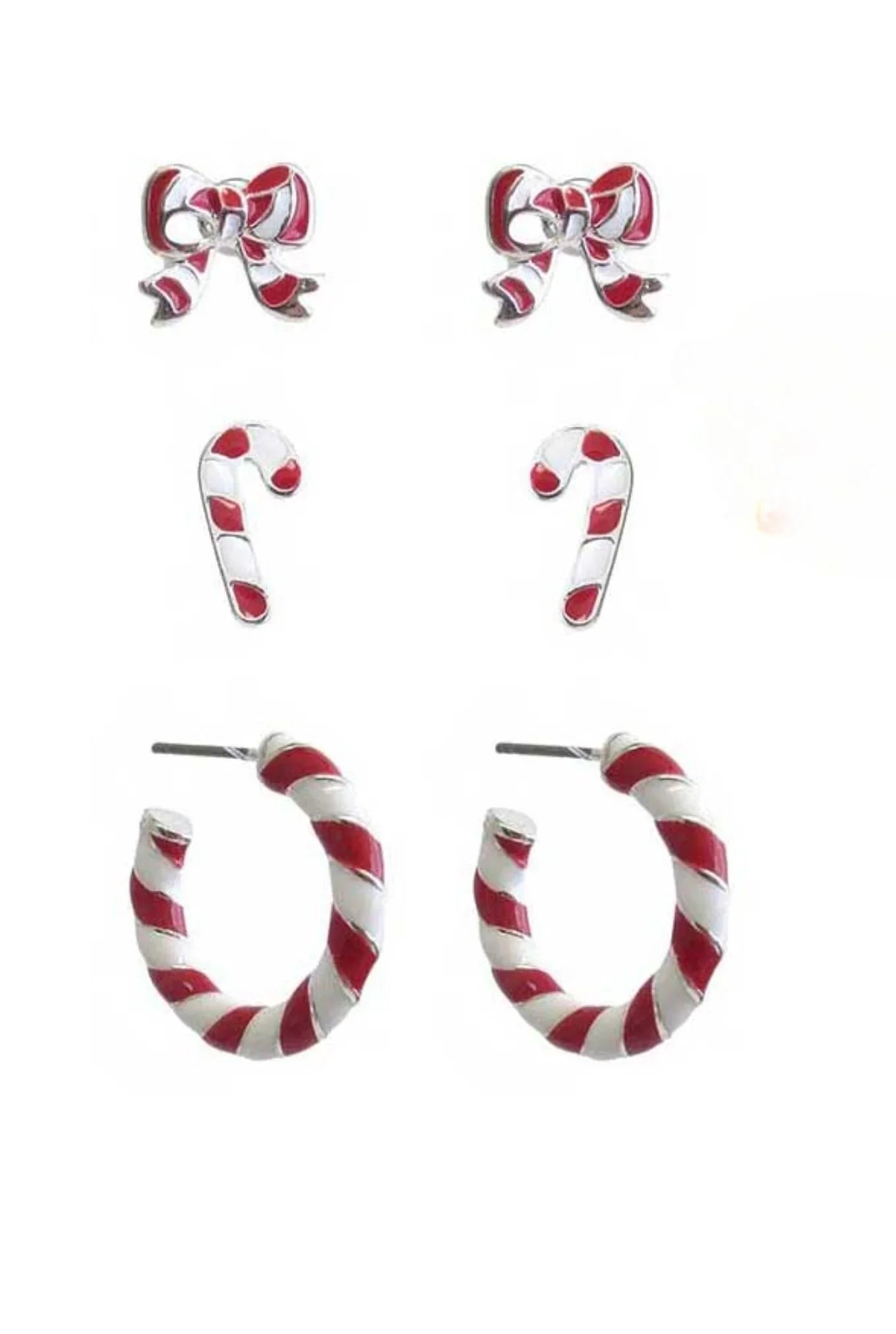Three pairs of Christmas-themed earrings featuring red and white candy cane stripes and bow designs