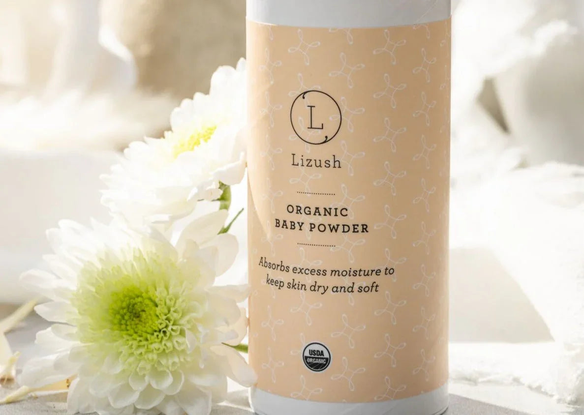 Lizush organic baby powder container with white flowers, soft natural skincare product