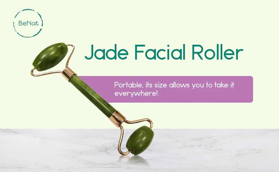 BeNat jade facial roller on marble surface, portable skincare tool at Qu!rk Boutique