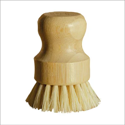 Bamboo handle dish brush with natural sisal fiber bristles on white background