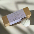 Slow North lavender bath bombs packaging with one round bath bomb on light background