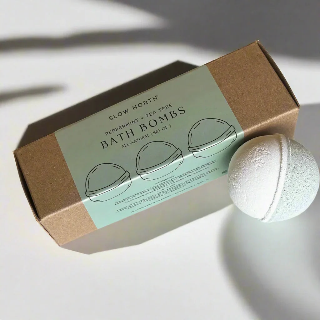 Slow North peppermint and tea tree bath bombs in kraft box with mint green label and white bath bomb