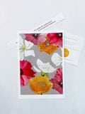 Colorful floral art print featuring pink, orange, red, and white cactus flowers on gray background