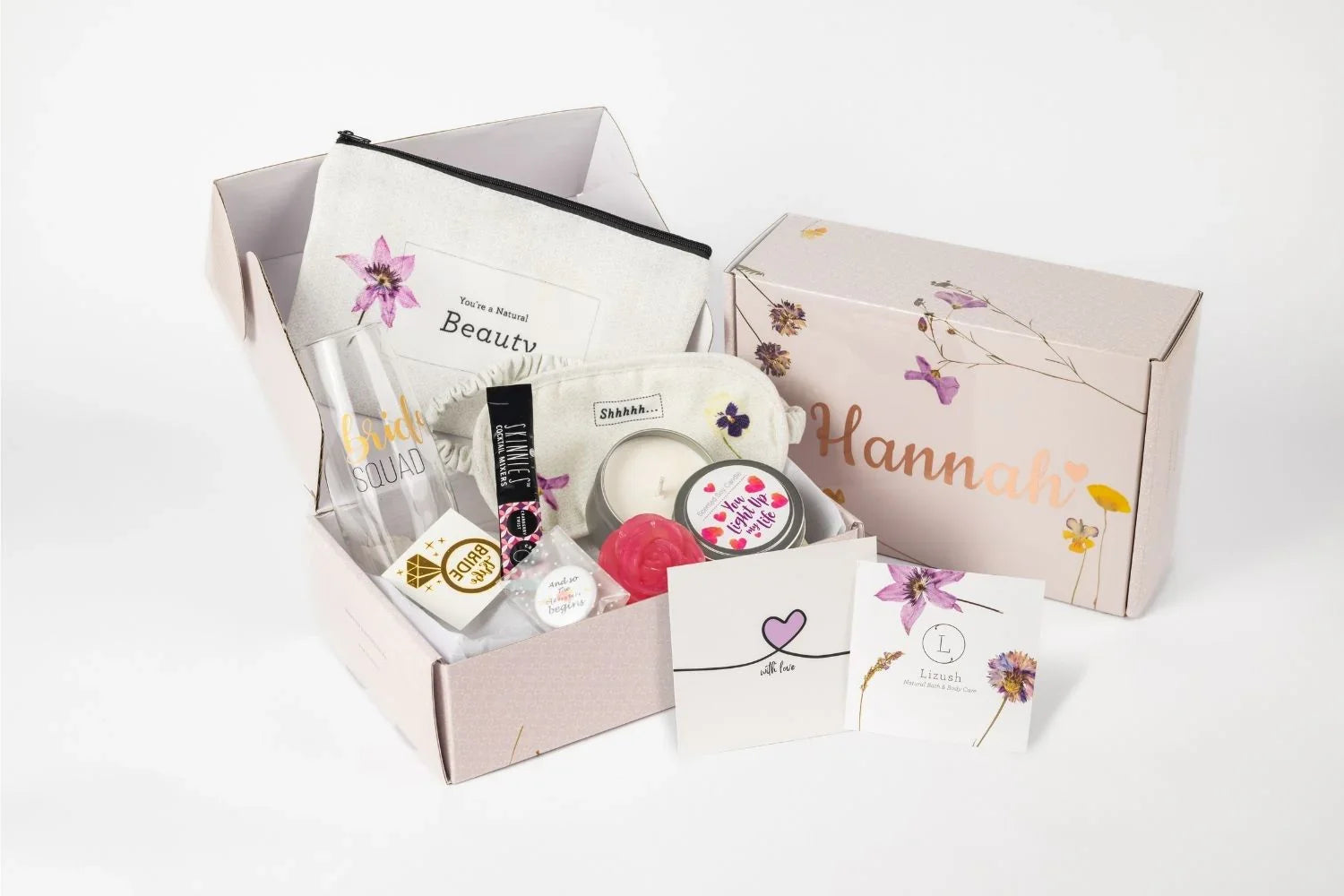 Personalized bridal gift box with floral design, beauty products, and self-care items from Qu!rk Boutique