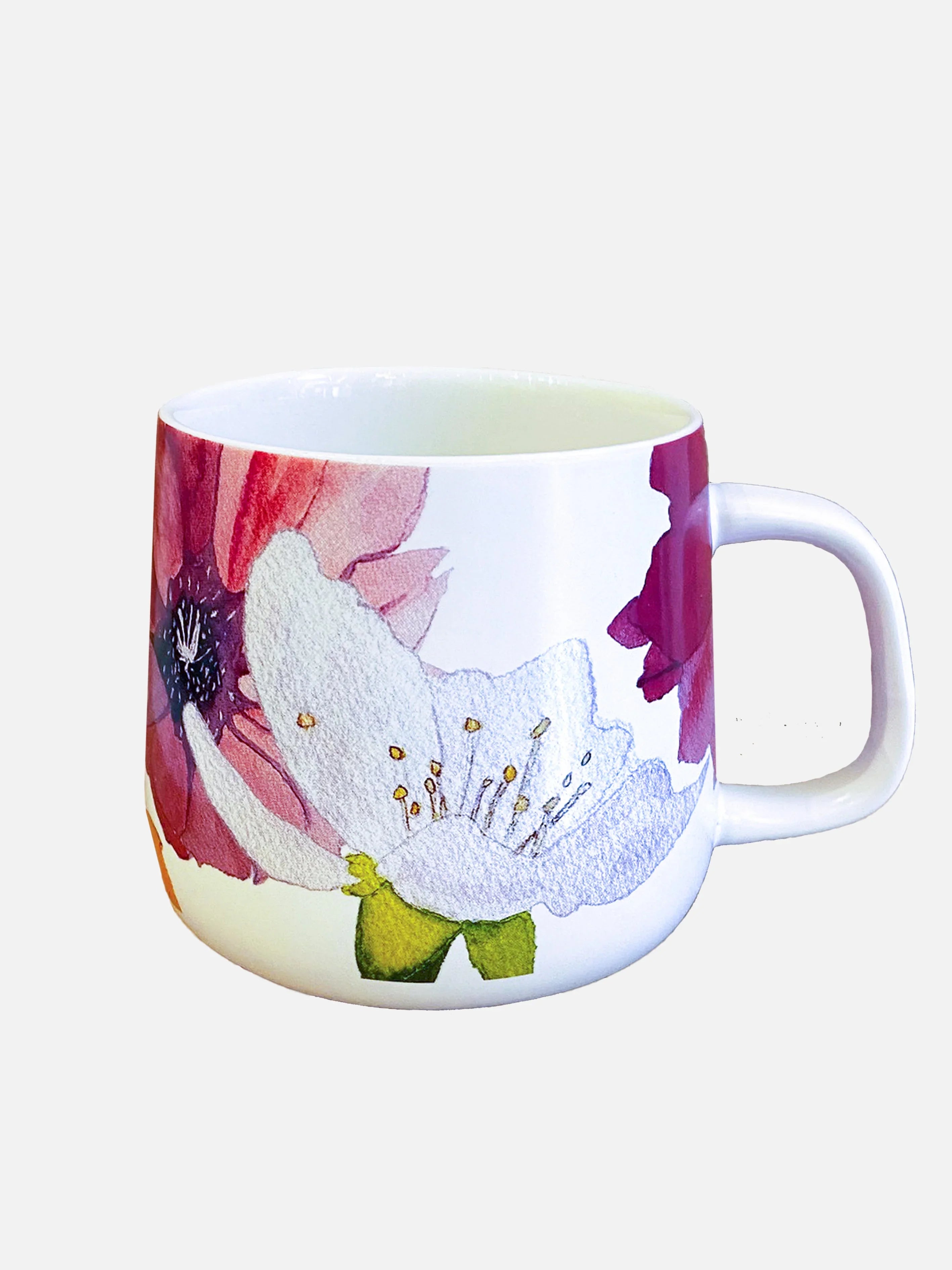 White ceramic mug with colorful watercolor-style cactus flower designs on a white background