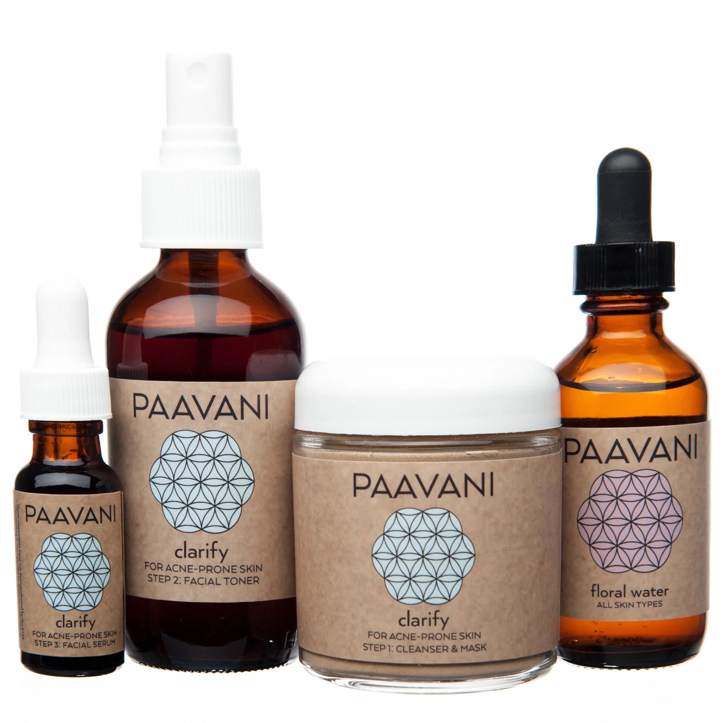 Paavani Clarify Skincare Set with amber glass bottles and jar, natural labels, white caps
