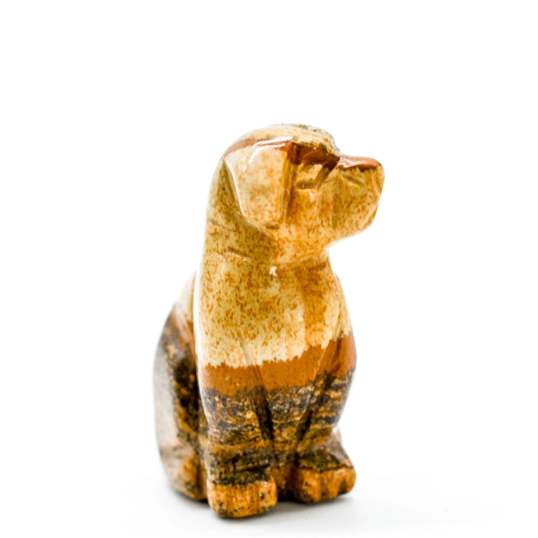 Handcrafted brown stone dog figurine on white background, artist-designed gift at Qu!rk Boutique