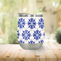 Stainless steel wine tumbler with blue tile pattern on wood table at Qu!rk Boutique