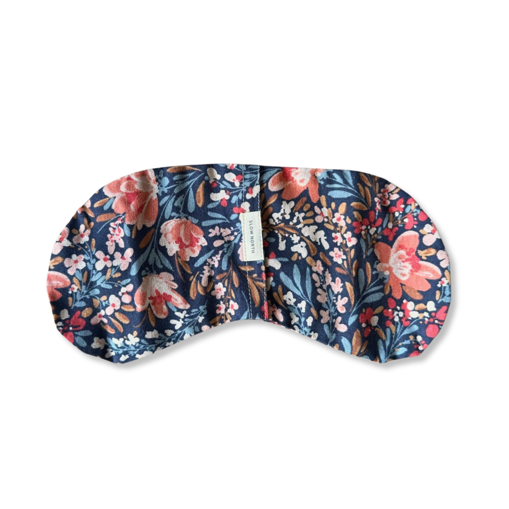 Floral patterned eye mask with pink and blue flowers and subtle label tag