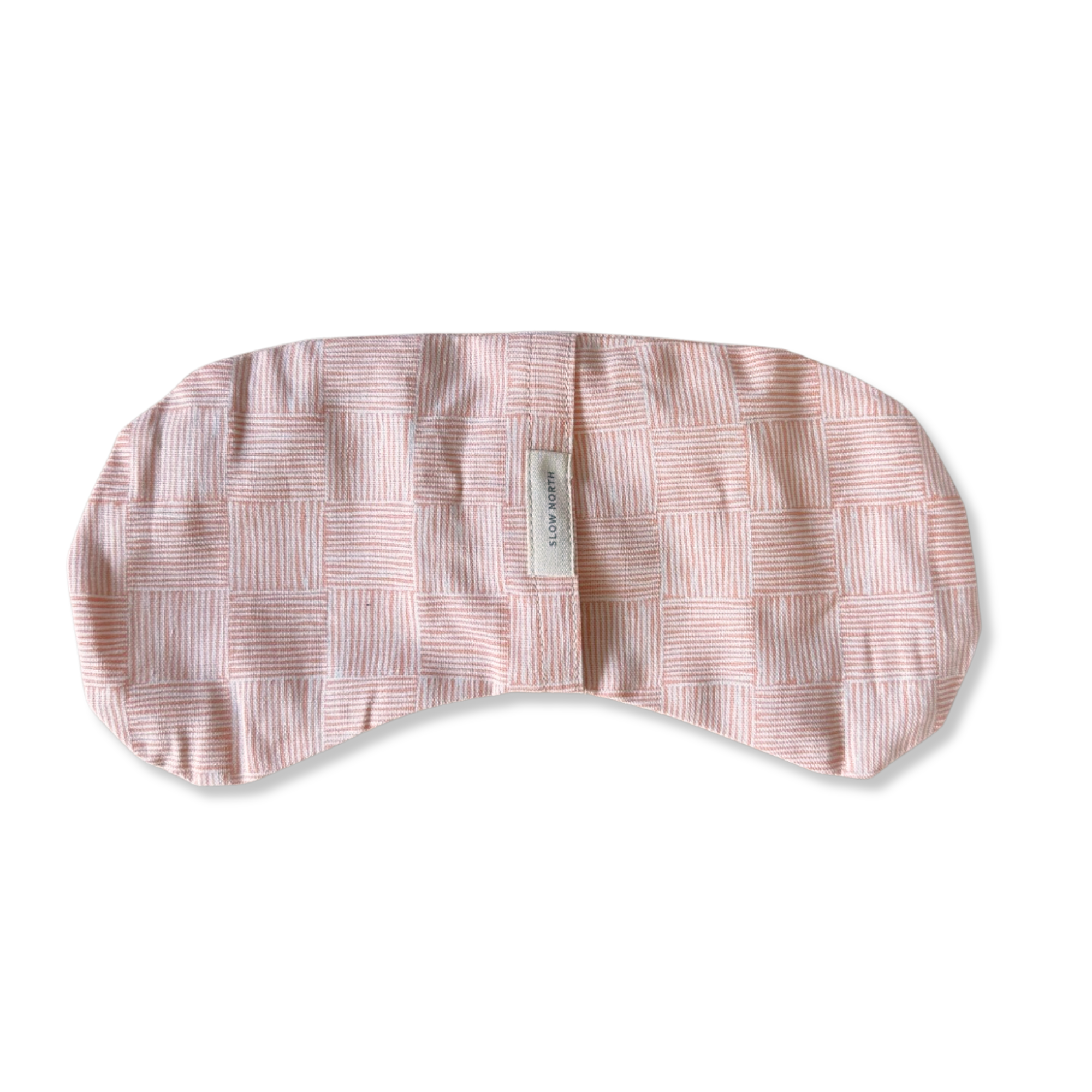Pink patterned eye mask with geometric square design and Slow North label