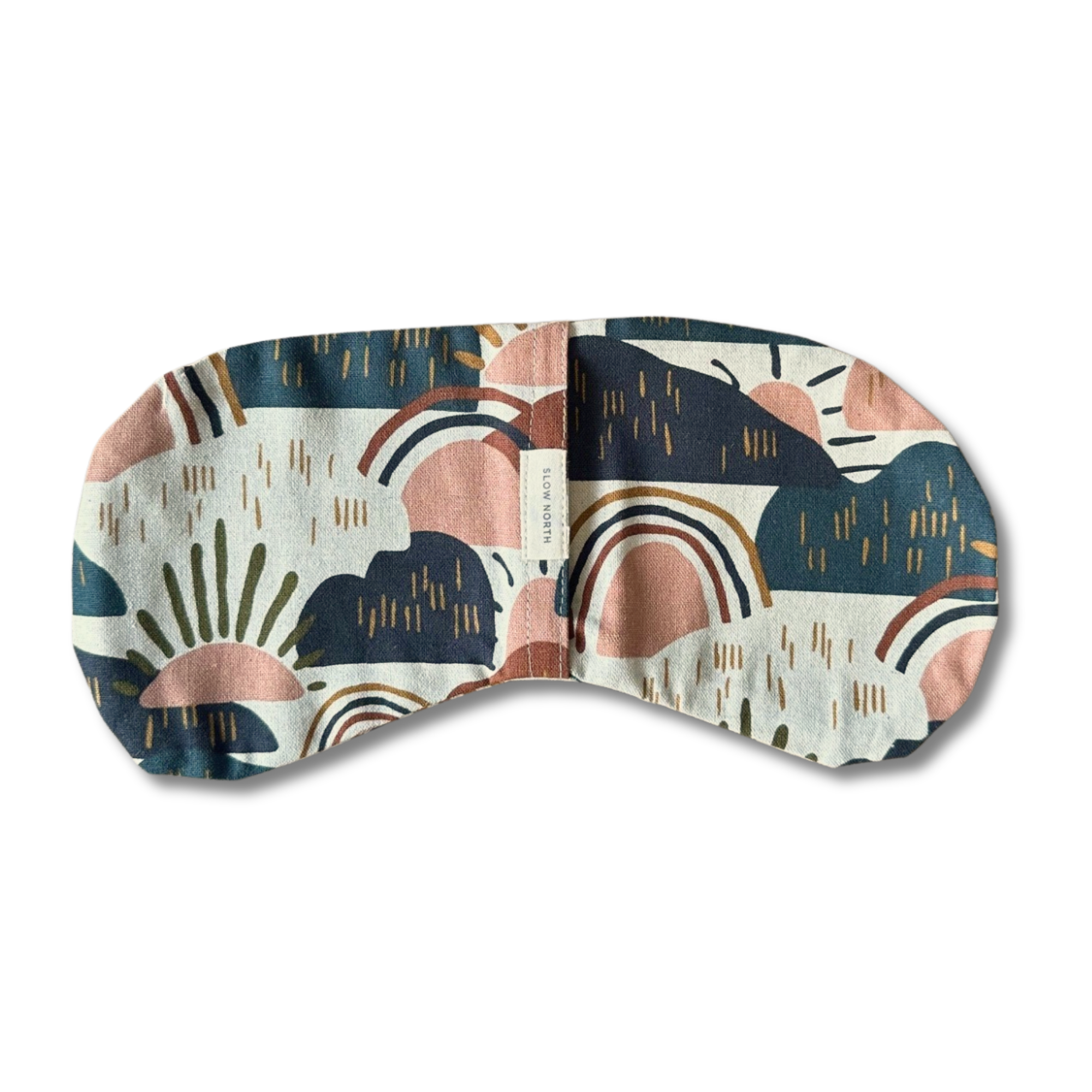 Soft fabric eye mask with colorful abstract rainbow and sun pattern in blue, pink, and green