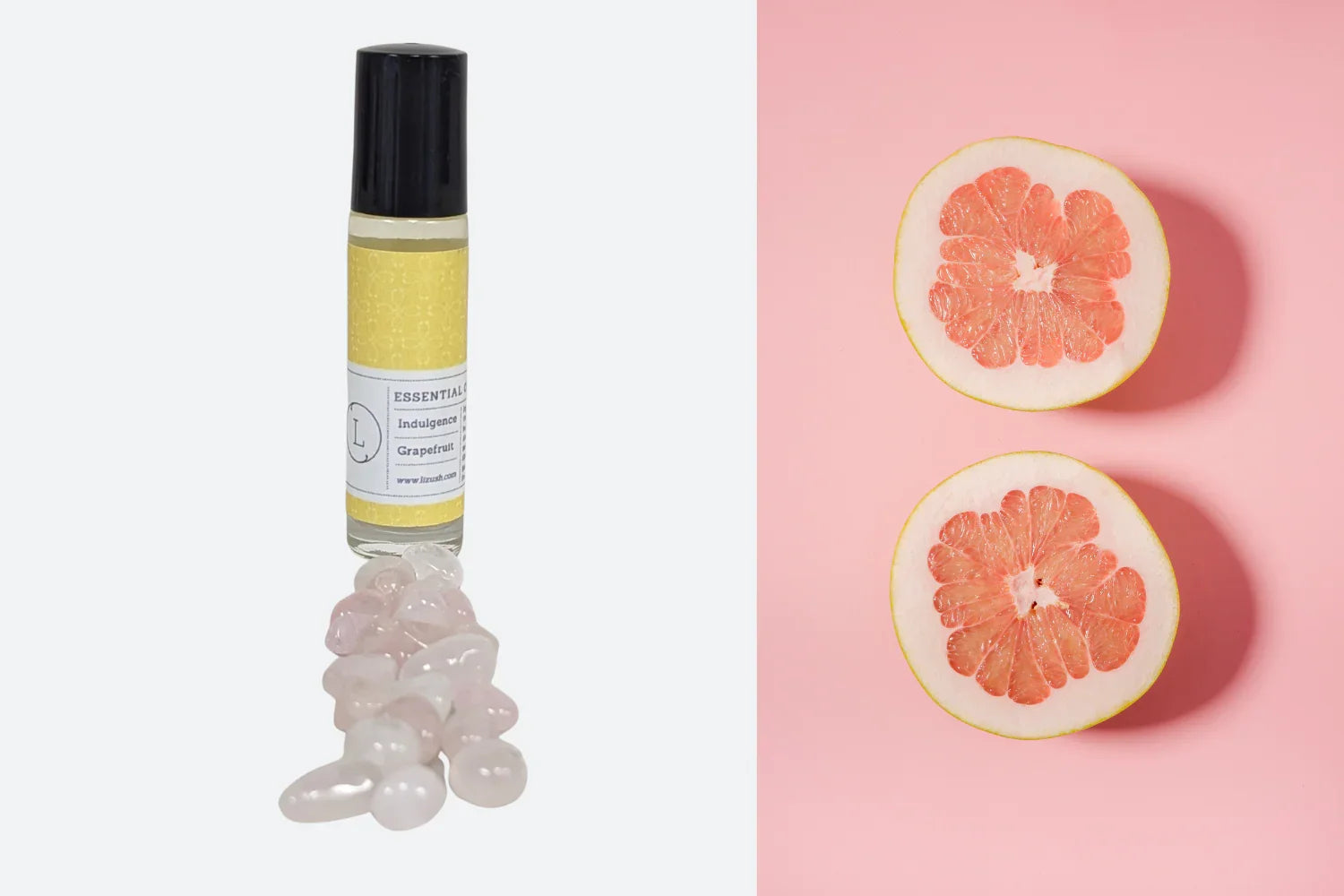 Roll-on grapefruit essential oil bottle with rose quartz crystals and grapefruit halves on pink background