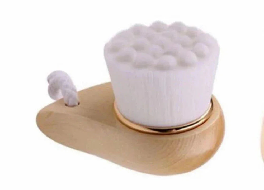 Soft-bristle wooden facial brush with gold accent, eco-friendly skincare tool at Qu!rk Boutique