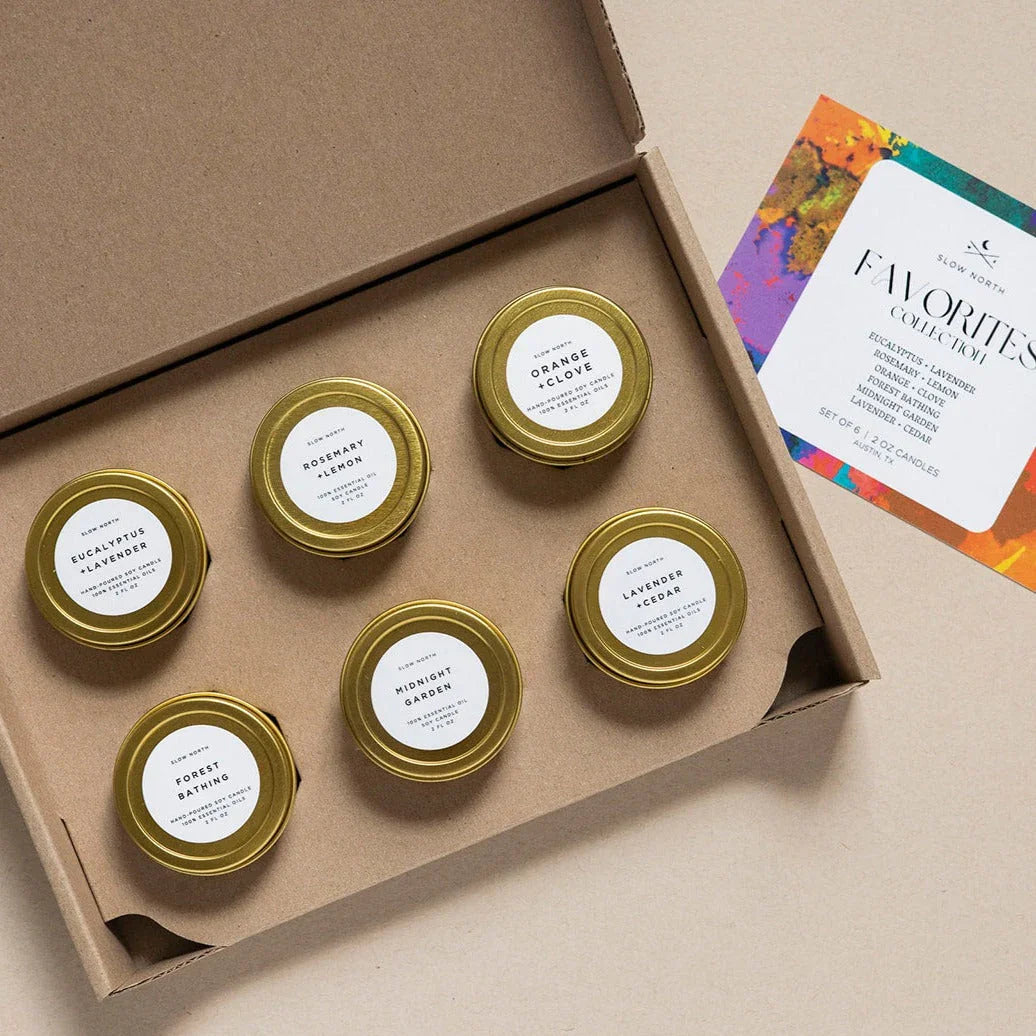 Slow North Favorites Collection set of six hand-poured soy candles in gold tins with natural scents