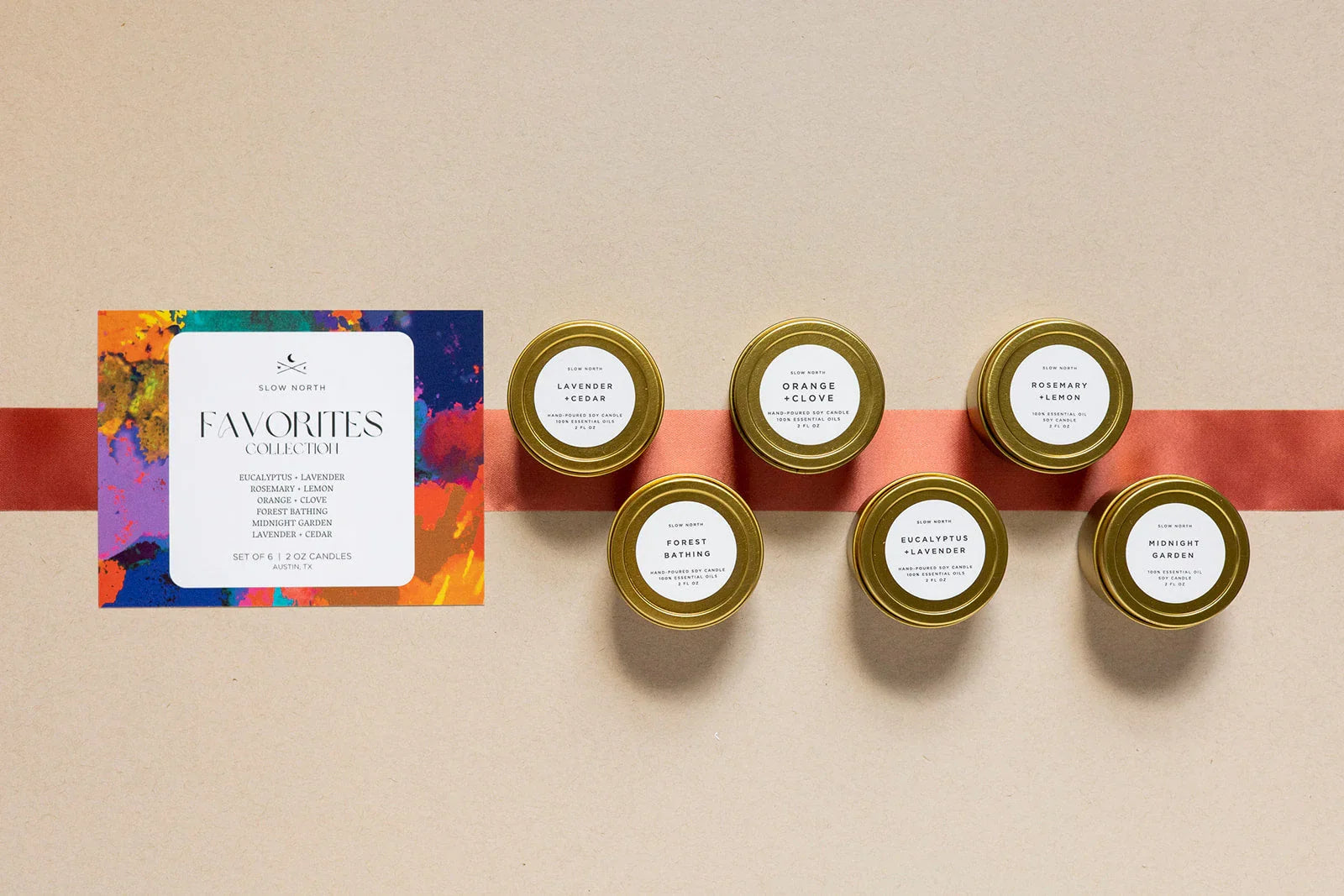 Slow North Favorites Collection set of six hand-poured soy candles with essential oils in gold tins