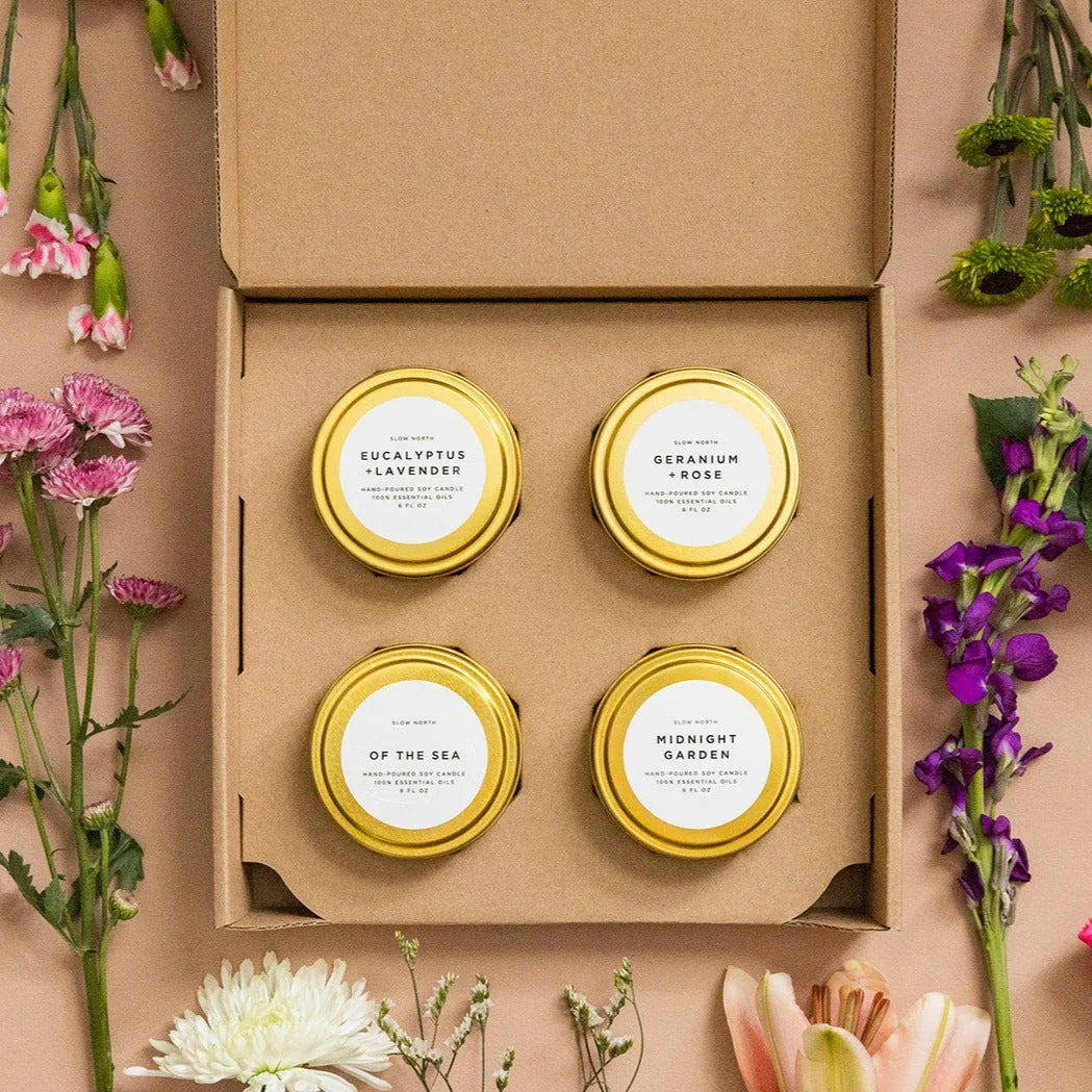 Floral soy candle gift set in gold tins with botanical accents, Qu!rk Boutique collection