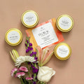 Slow North Floral Collection soy candles with gold lids and assorted flowers, Qu!rk Boutique gifts