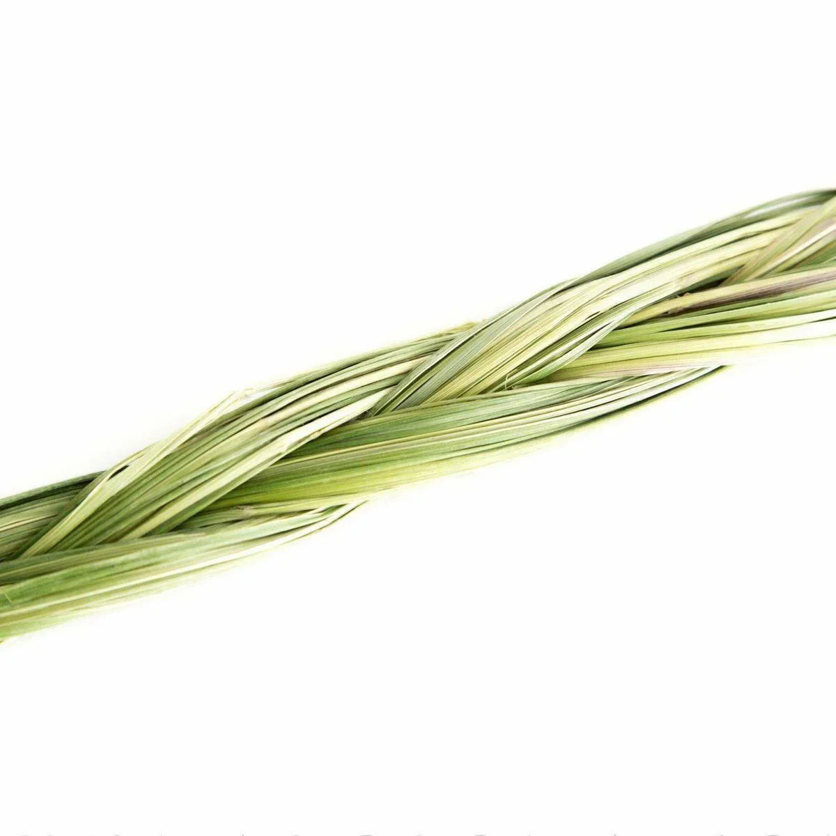 Ethically sourced sweetgrass braid on white background from Qu!rk Boutique