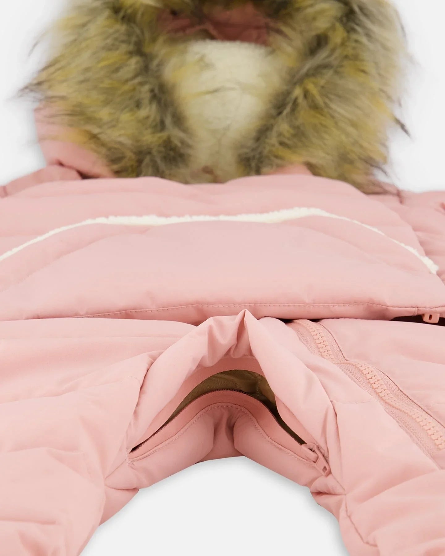 Pink faux fur hooded snowsuit with front zipper, cozy winter outerwear at Qu!rk Boutique