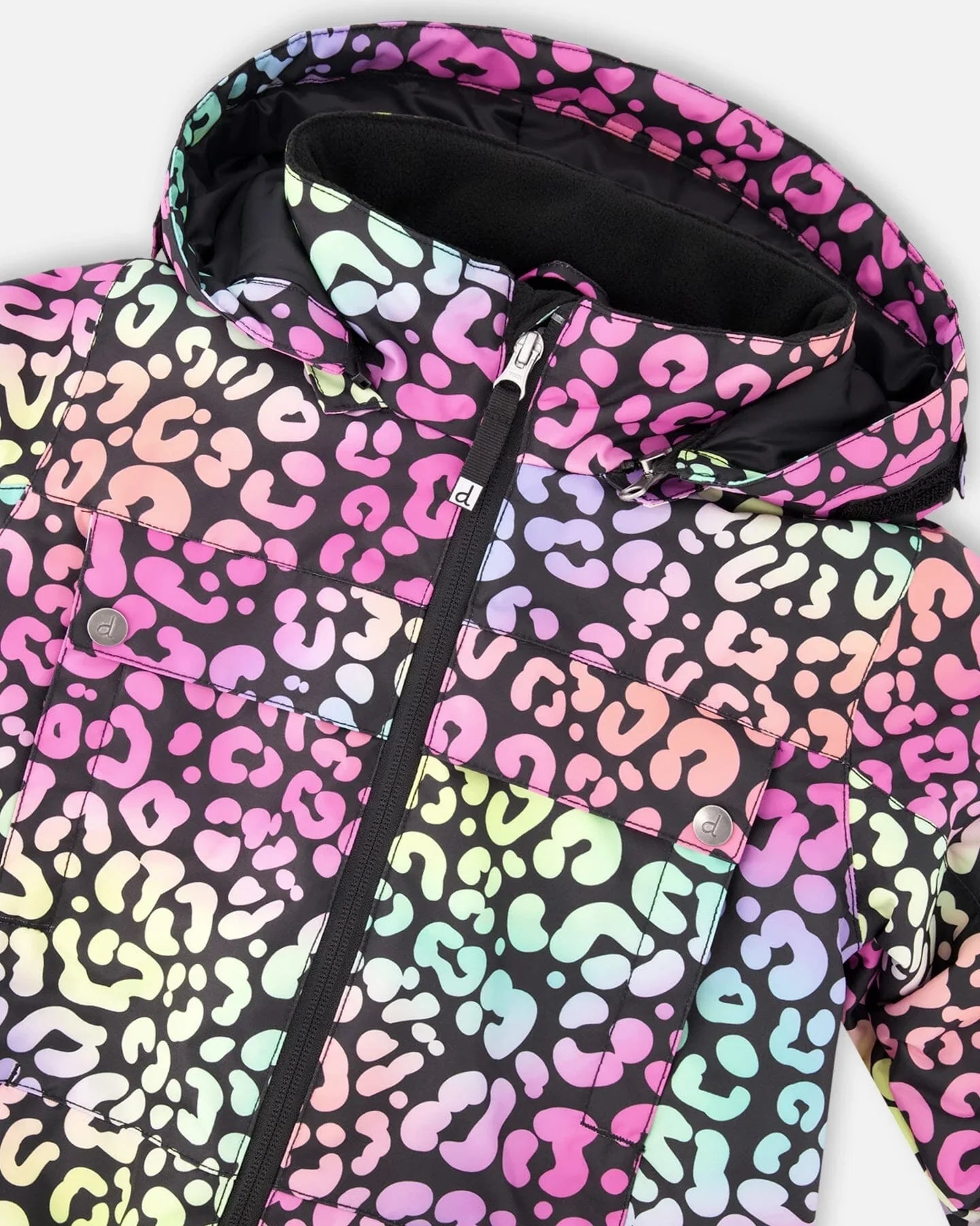 Colorful leopard print puffer jacket with pastel tones, femme-fit, Qu!rk Boutique style