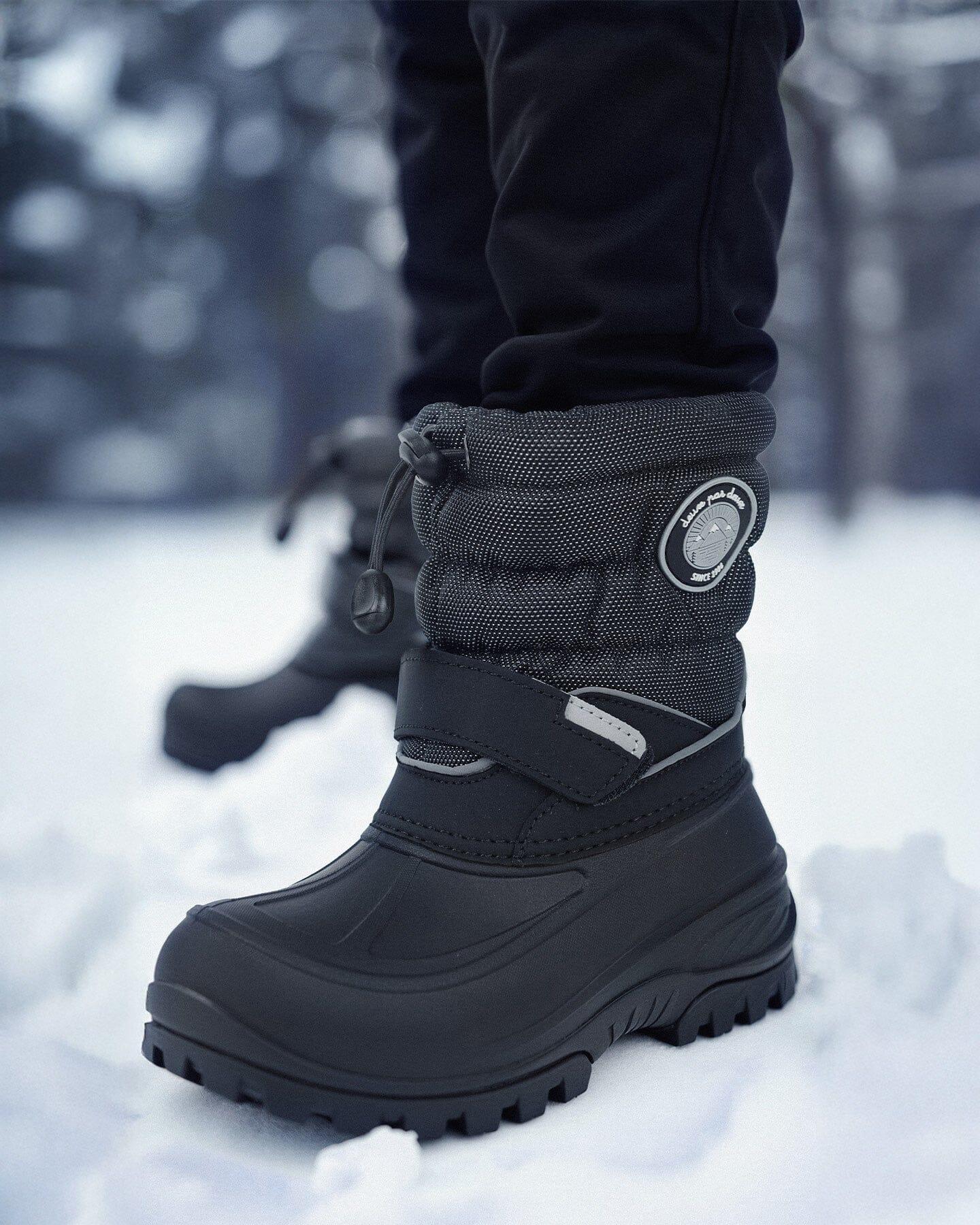 Black winter boots for women in snow, durable grip sole, outdoor fashion from Qu!rk Boutique