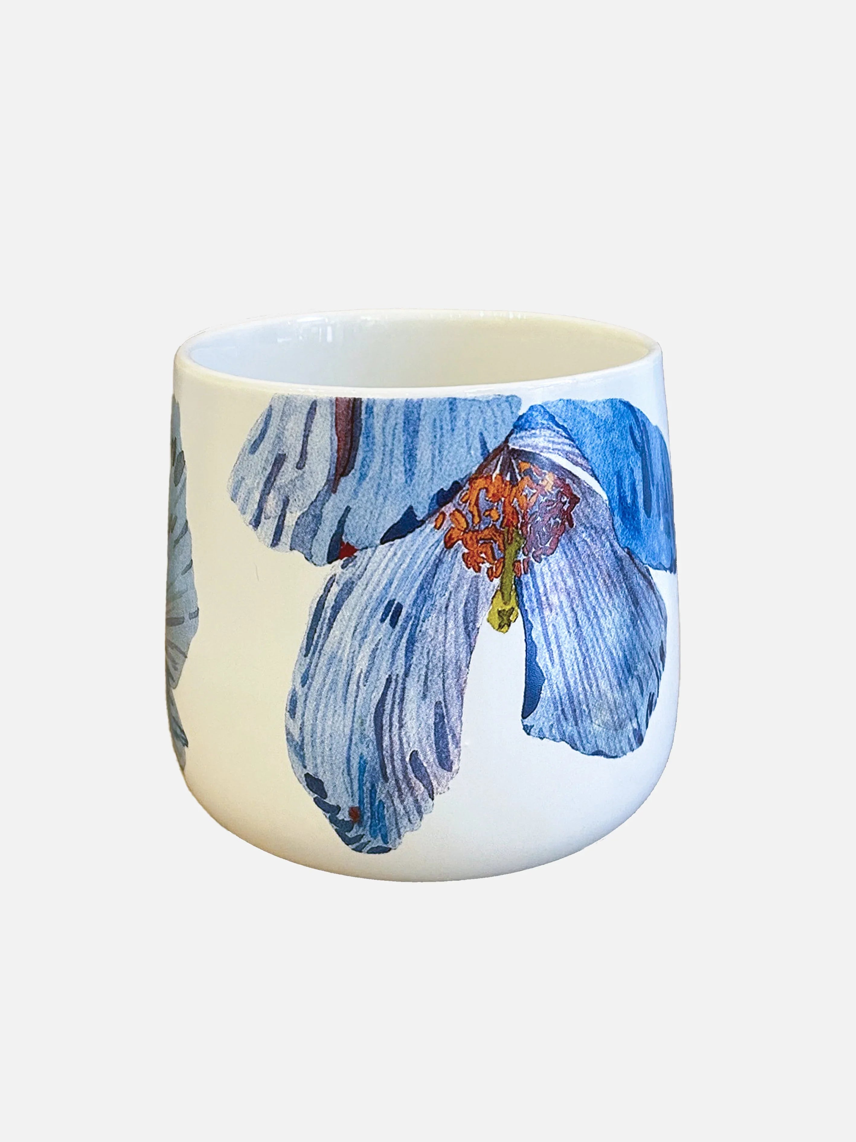 White ceramic mug with hand-painted blue Himalayan poppy flowers and orange accents
