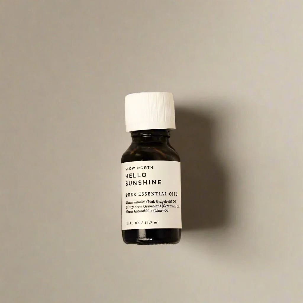 Slow North Hello Sunshine essential oil blend bottle on neutral background at Qu!rk Boutique