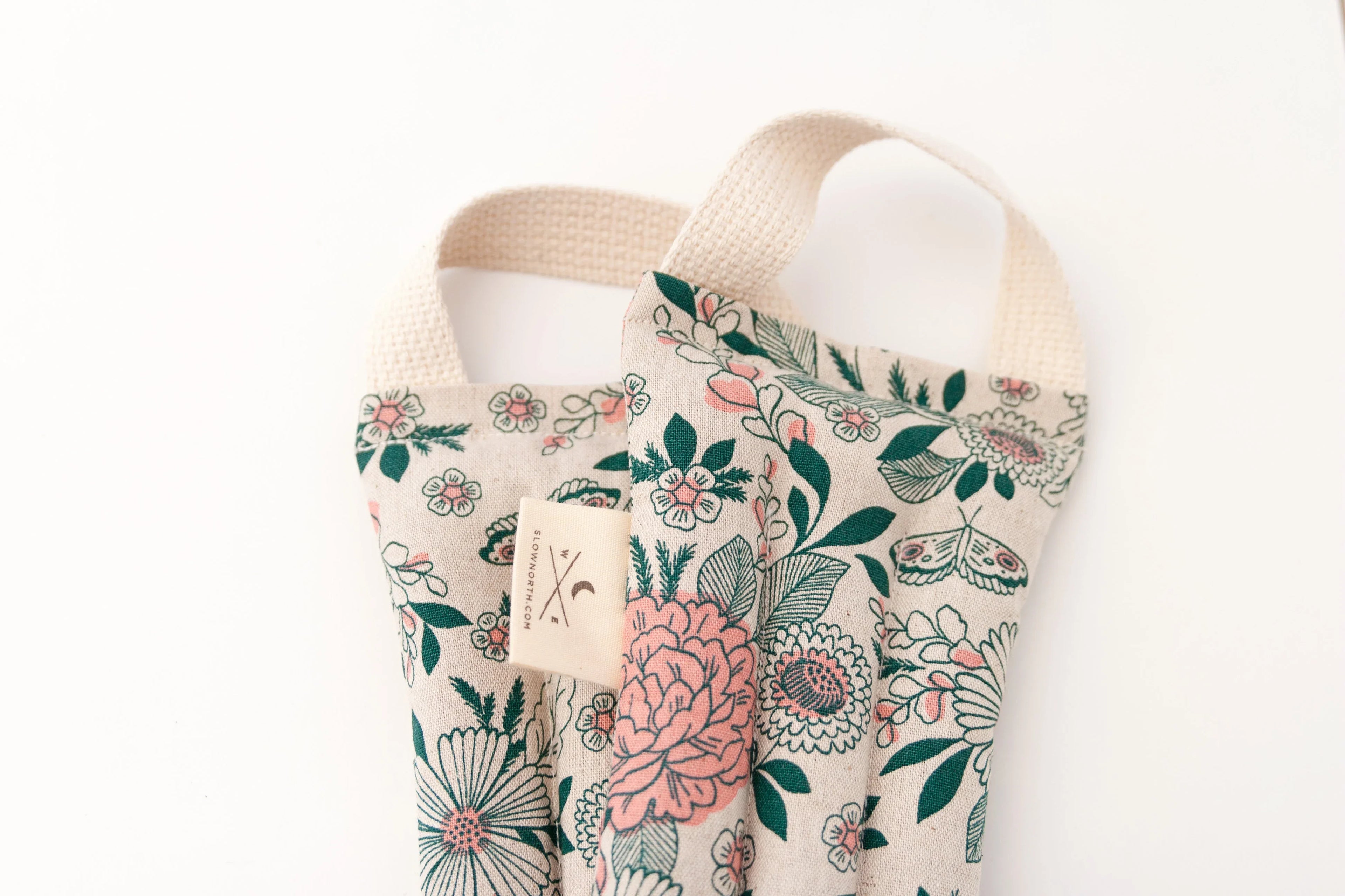 Floral artist-designed fabric bag with natural handles from Qu!rk Boutique