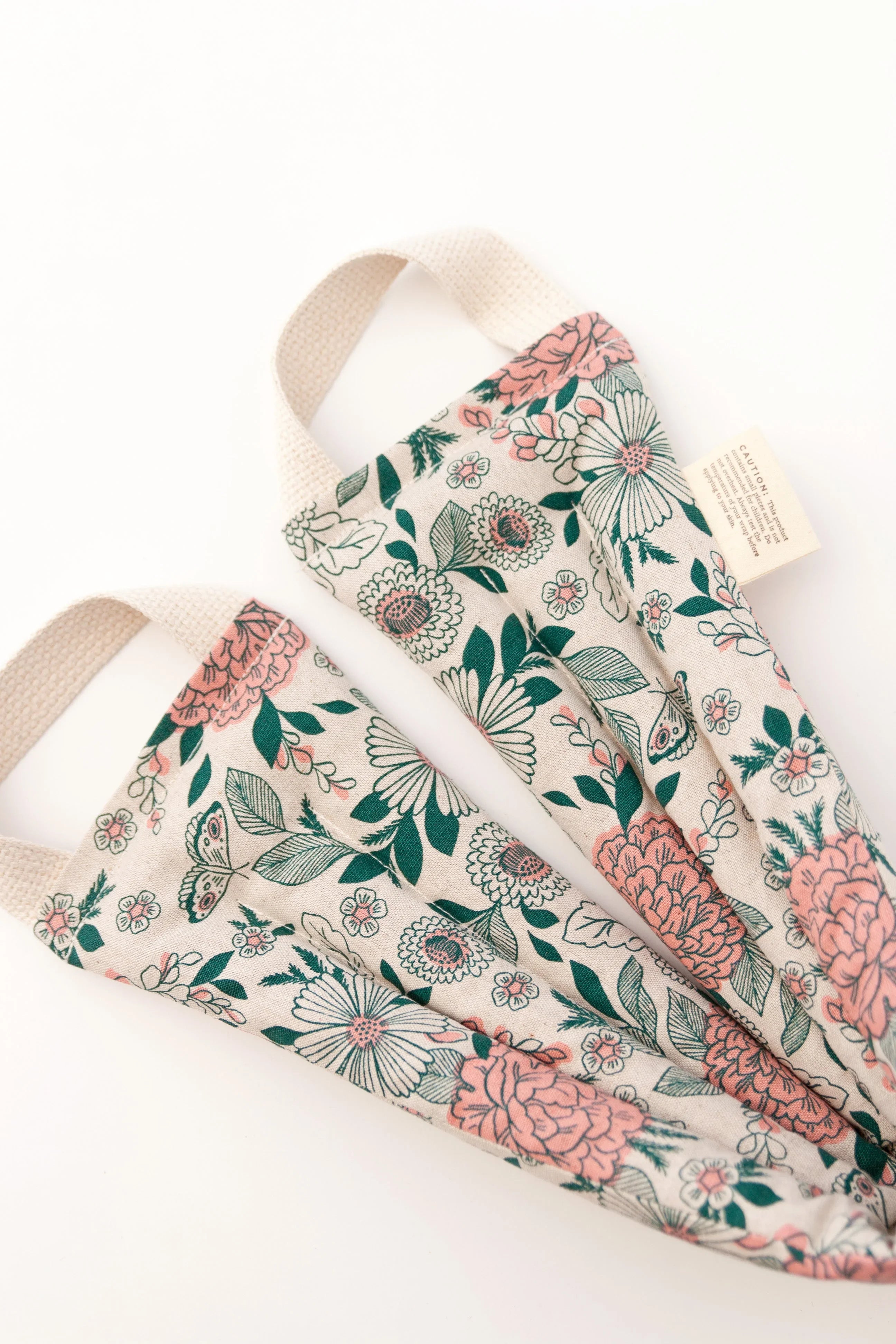 Floral fabric straps with pink and green botanical print at Qu!rk Boutique & Gift Shop