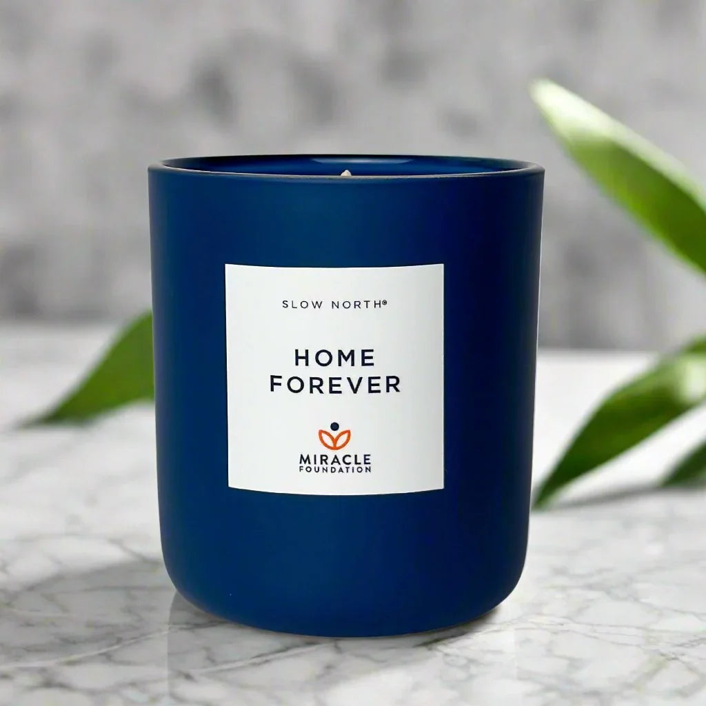 Blue Slow North Home Forever candle on marble, eco-friendly gift at Qu!rk Boutique