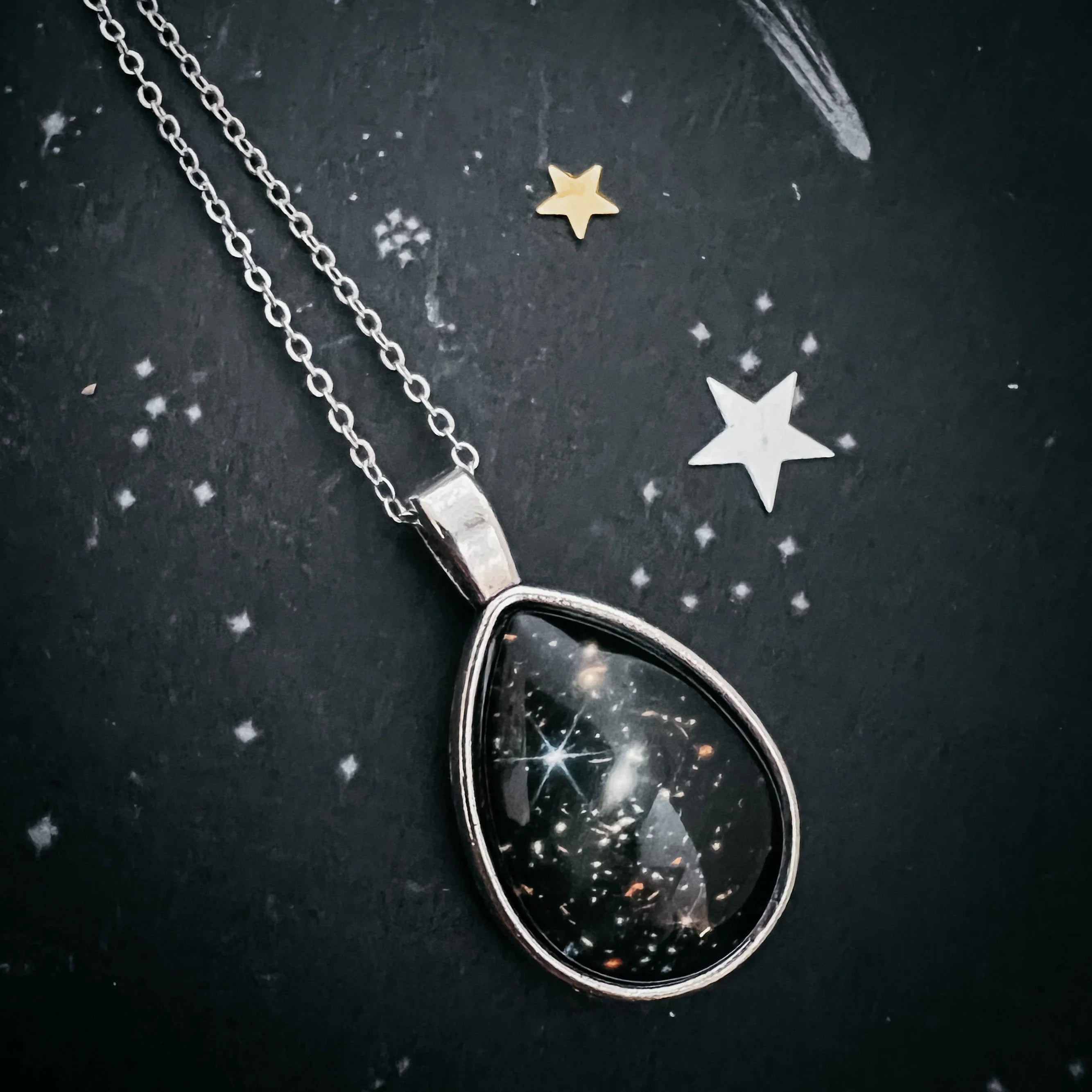 Cosmic teardrop pendant necklace with star accents, Qu!rk Boutique artist-designed jewelry