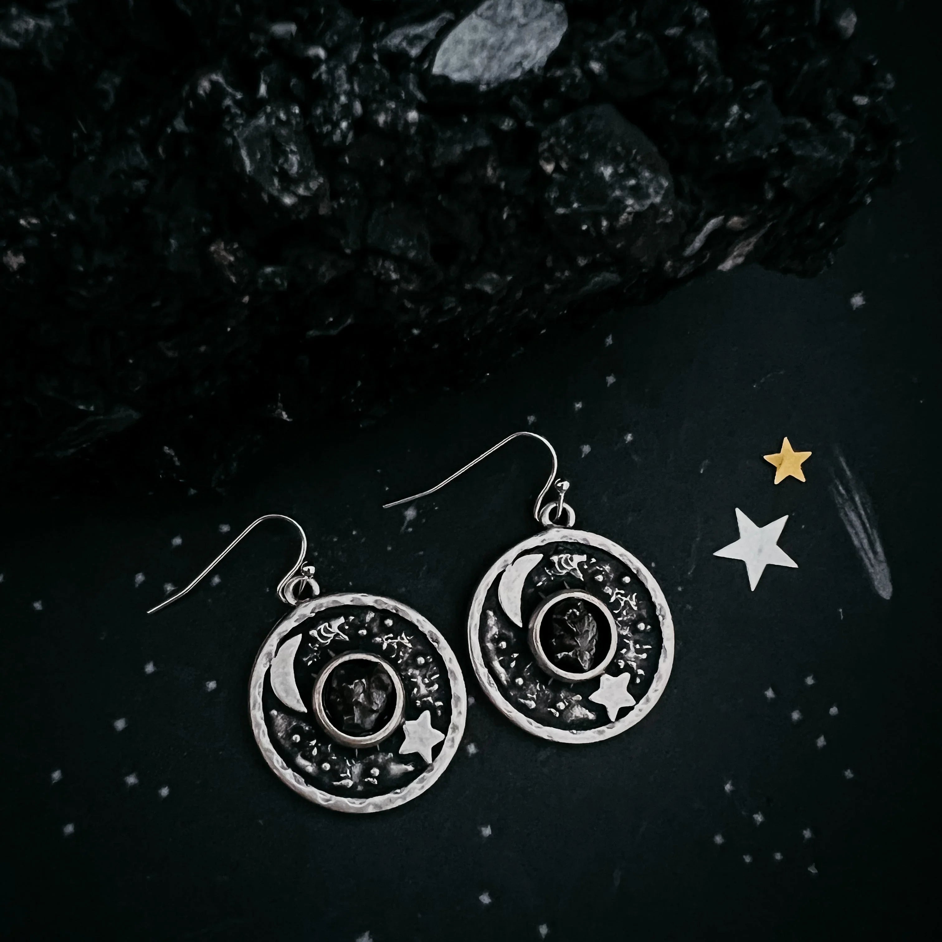 Cosmic moon and star silver earrings on dark background, Qu!rk Boutique artist-designed jewelry