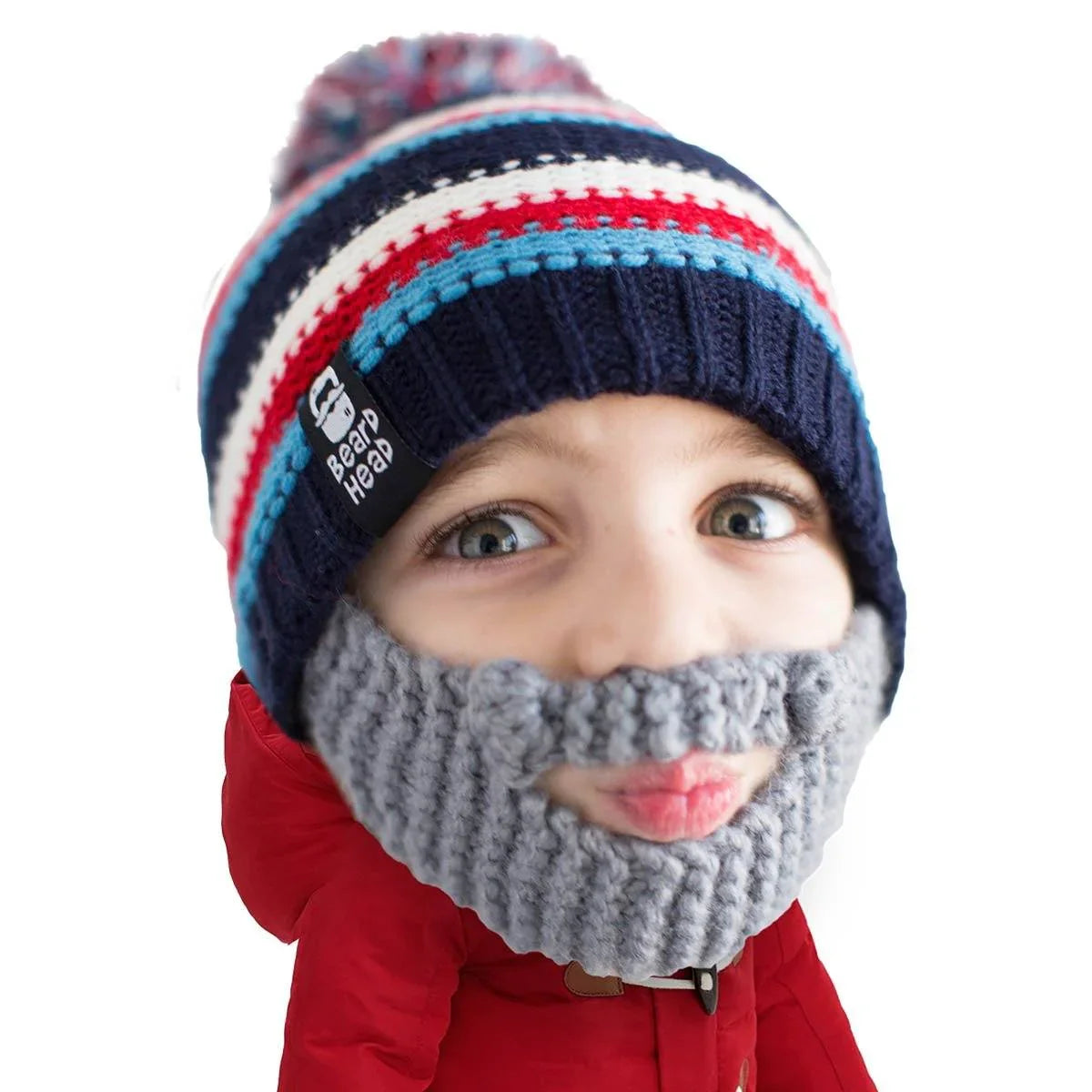 Child wearing a colorful striped knit beanie with pom-pom and gray knit beard mask