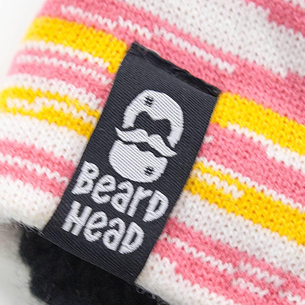 Beard Head knit hat label on striped pink, yellow, and white fabric winter beanie