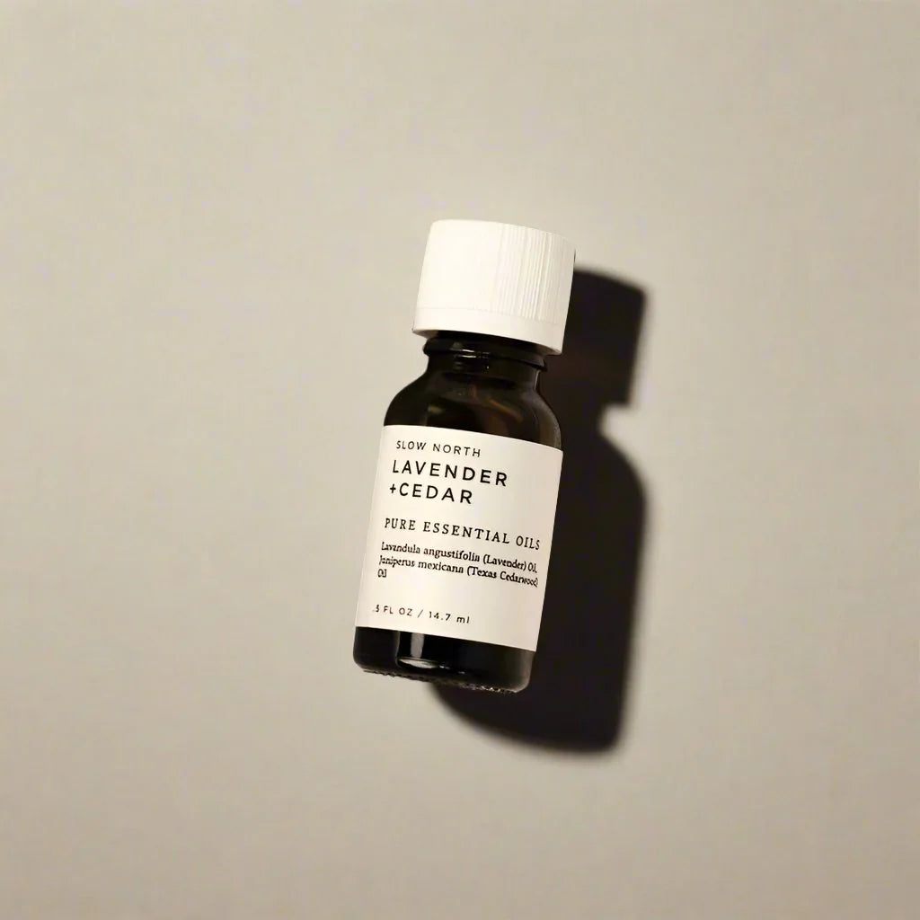 Lavender Cedar essential oil bottle on neutral background, eco-friendly boutique product