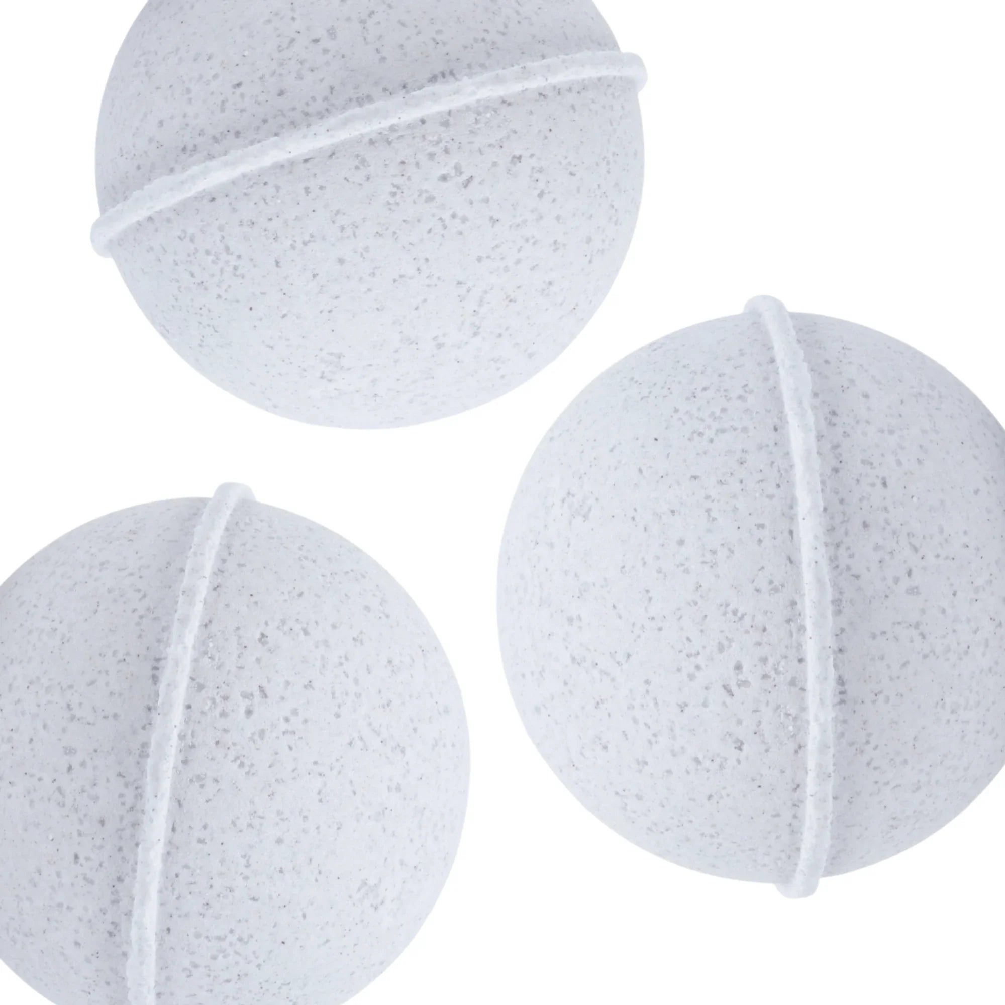 Three white speckled lavender-scented bath bombs on a white background