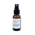 Slow North Lemongrass Tangerine linen spray in amber glass bottle with black spray top