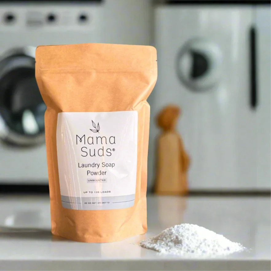MamaSuds Laundry Soap Powder Unscented pouch and powder on counter in modern laundry room