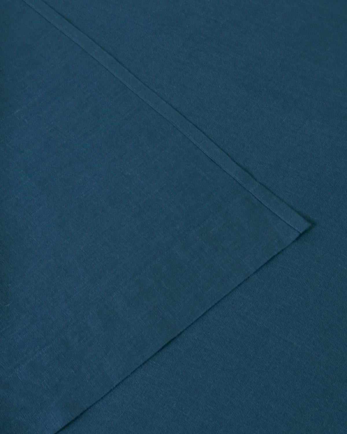 Adriatic blue Marcel linen flat sheet close-up, sustainable bedding at Qu!rk Boutique