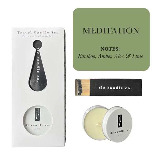 Meditation travel candle set with 2oz tin candle, matches, and scent notes of bamboo, amber, aloe, and lime