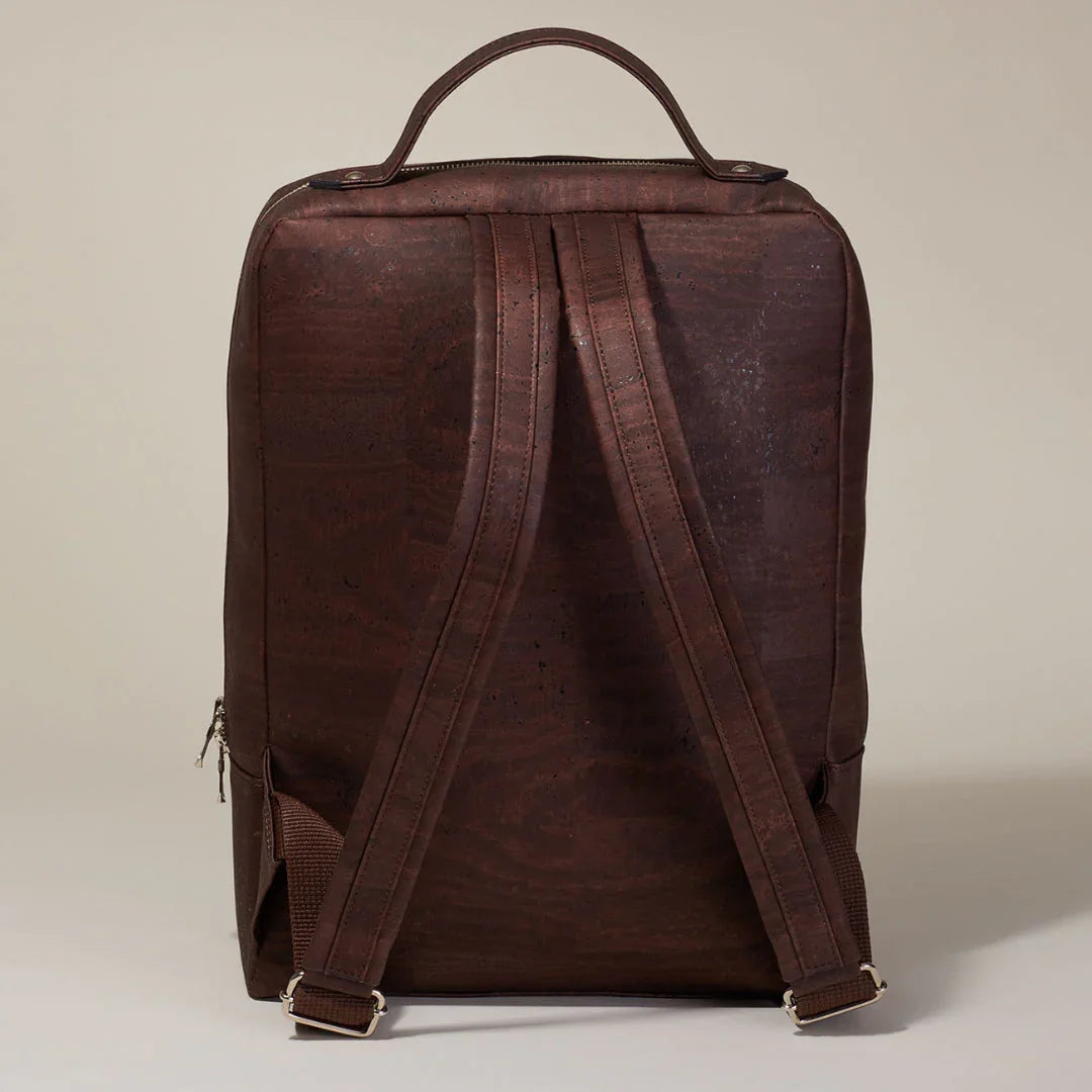 Sustainable brown vegan leather backpack with adjustable straps, featured at Qu!rk Boutique.