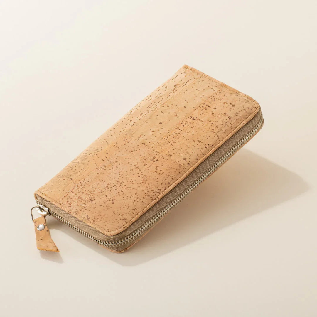 Natural cork zip wallet on cream background, eco-friendly accessory from Qu!rk Boutique
