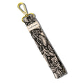 Black and white floral wristlet keychain with gold clasp and Slow North label