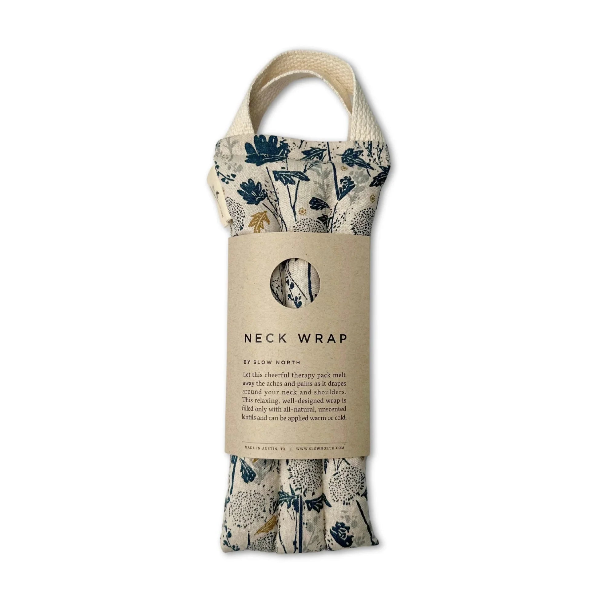Floral patterned neck wrap by Slow North with natural filling, packaged in a beige label with handle