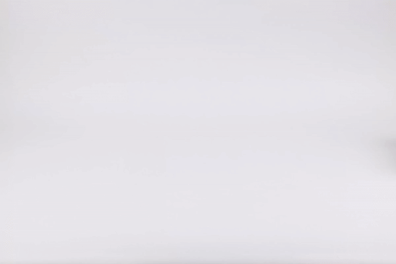 Natural skincare spa gift set box with organic creams, jars, and botanical packaging on white background