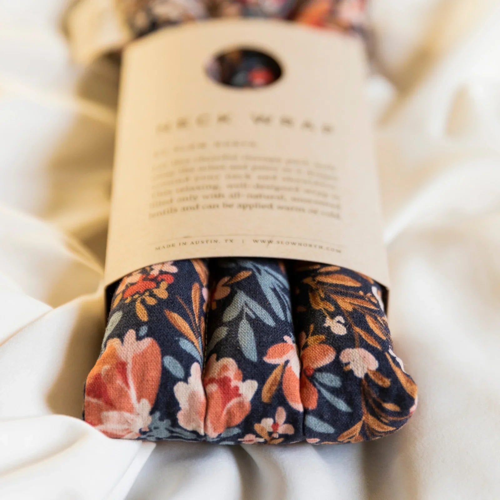 Botanical floral neck wrap with pom blossom pattern on fabric, eco gift at Qu!rk Boutique