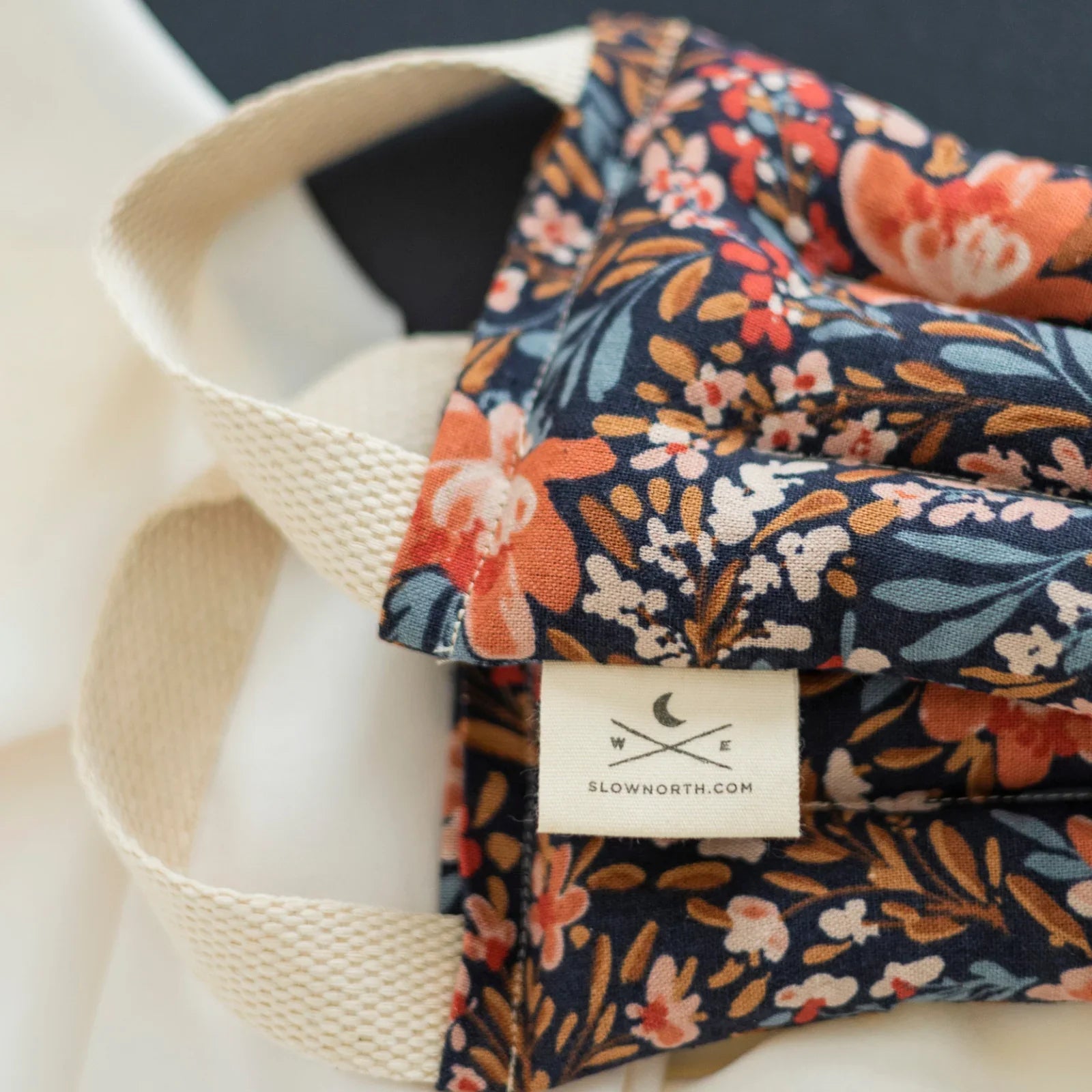 Floral neck wrap with handles, cotton fabric, Pom Blossom by Slow North, Qu!rk Boutique