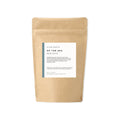 Slow North Of The Sea bath salts in a brown resealable kraft paper bag with white label