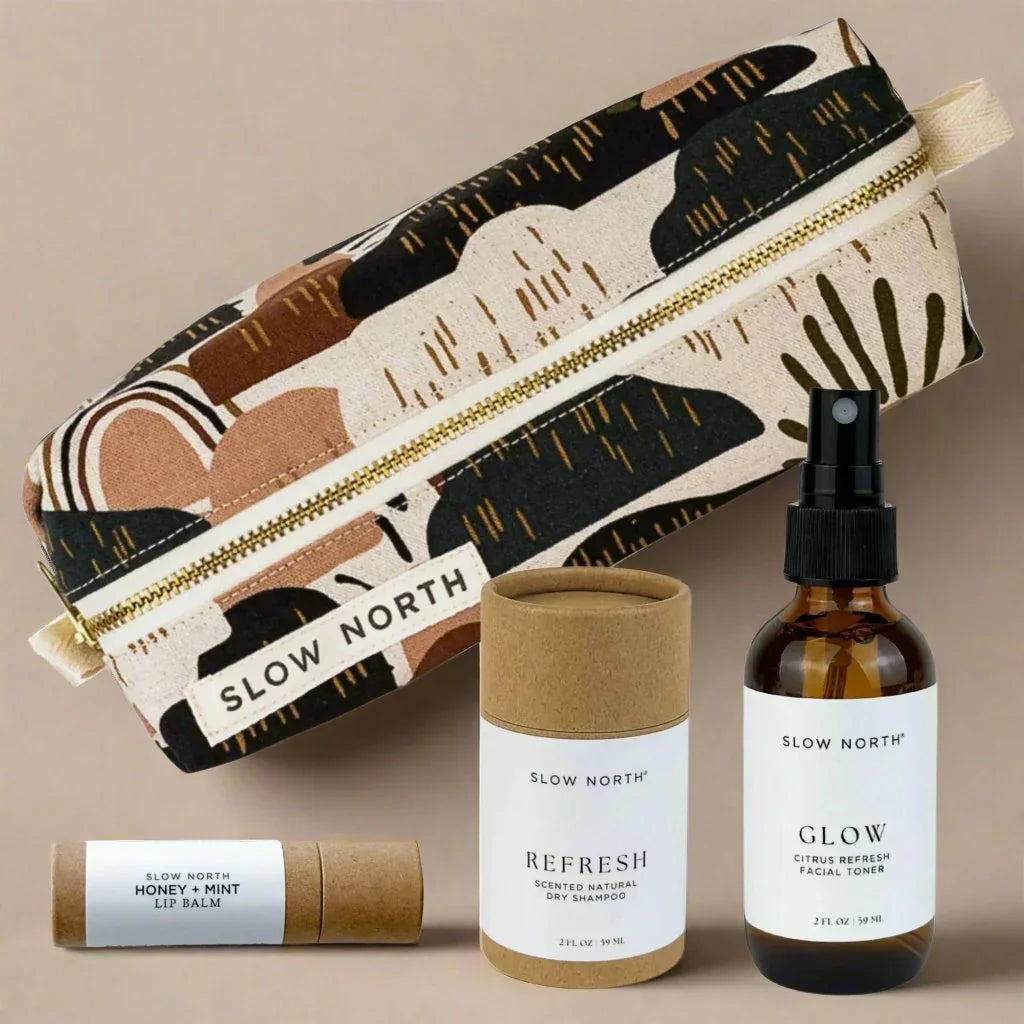Slow North skincare set with patterned zip pouch, honey mint lip balm, dry shampoo, and citrus facial toner